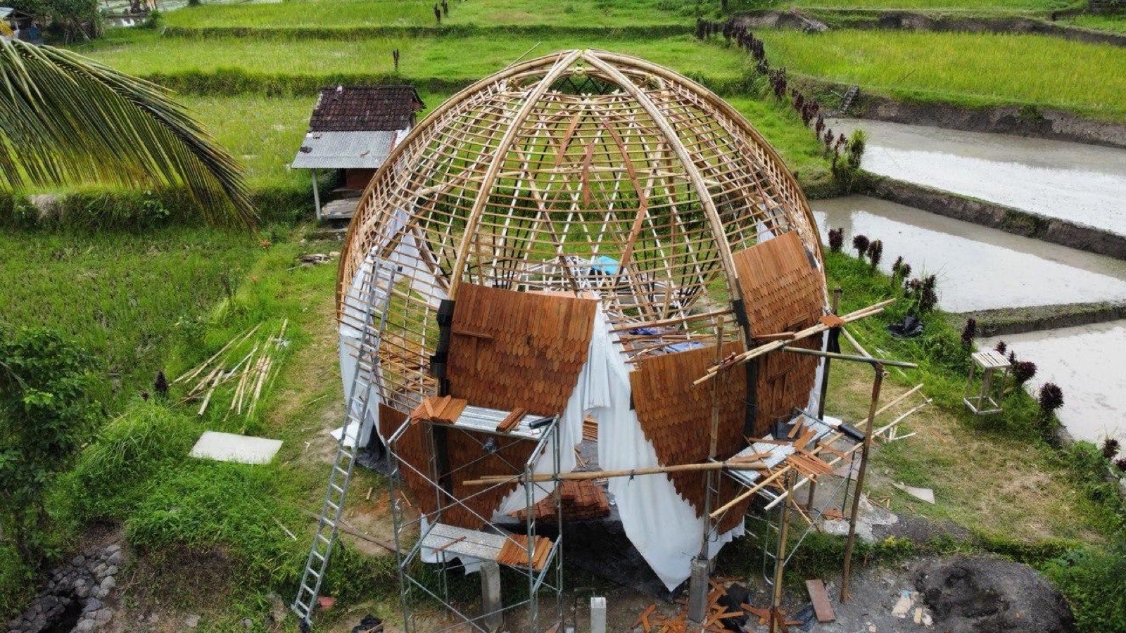Bamboo dome under construction in the Bali rice fields